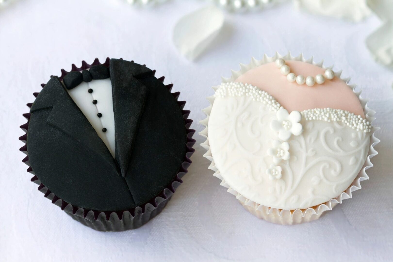 bride and groom shaped wedding cake